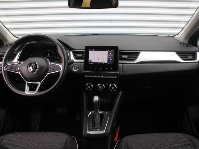 Renault CAPTUR 1.6 E-Tech Hybrid 145 Intens | Trekhaak | Stuurverwarming | Camera | Dodehoek detectie | Cruise adapt. | Telefoonlader | 17" LM | LED | Clima |