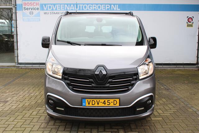 Renault TRAFIC 1.6 dCi T29 L2H1 DC 5 Persoons Comfort Energy | Incl. 12 maanden Garantie | Trekhaak | Stoelverwarming | Cruise controle | Climate controle | Achteruitrijcamera | Parkeersensoren achter | Navigatie | Lederen bekleding | Dak rails | Origineel NL Auto | NAP