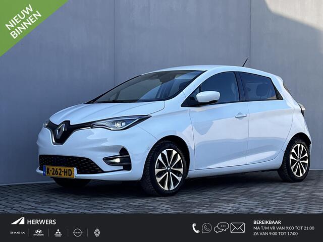 Renault ZOE R135 Intens 52 kWh / Dealer onderhouden / Koop Accu SoH 95,82 % / NL auto / Batterijgarantie tot 12-2028 < 160.000 km / CCS snelladen / Navigatie / Achteruitrijcamera / Stuur- en stoelverwarming / Dode hoek detectie / Apple Carplay Android / 16" LM wielen