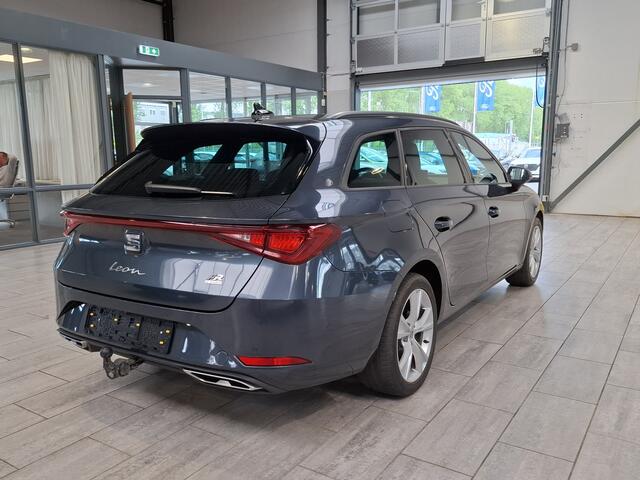 Seat LEON Sportstourer 1.5 TSI e-Hybrid 204pk FR Business | Trekhaak | Stoel- en stuurwiel verwarming | Adapt. Cruise | Camera | 1/2 leer | Fabrieksgarantie t/m 05-2029 |