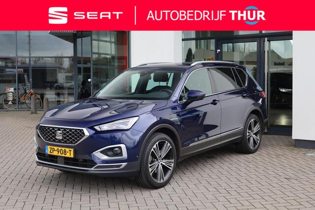 Seat Tarraco 1.5 TSI Xcellence 7p. 7 zits panoramadak wegklapbare trekhaak 20" LMV camera chrome dakrailing multifunctioneel lederen stuurwiel stoelverwarming keyless go & entry privacy glas spiegels elektrich inklapbaar virtual cockpit navigatie ACC adaptieve cruise