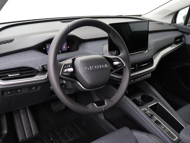 Skoda Elroq 85 Business Edition Tour 286 PK | Wegklapbare Trekhaak | Business Upgrade Clever | 20" lichtmetalen velgen | Navigatie |