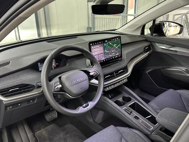 Skoda Elroq 60 Business Edition Tour 204 pk | ACC | Stoel- & Stuurverwarming | Camera | Navi | Draadloze lader
