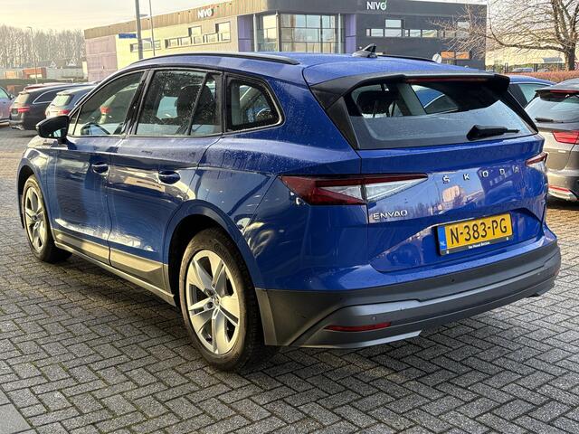 Skoda Enyaq iV 60 | Wegklapbare trekhaak | Stoelverwarming | Achteruitrijcamera | Warmtepomp