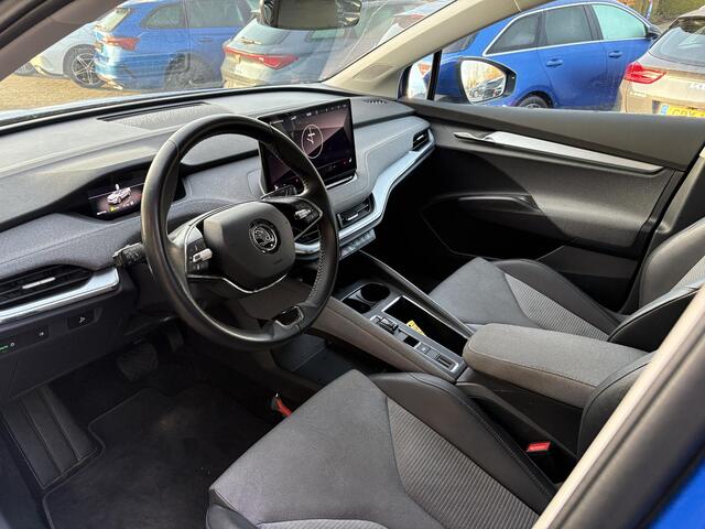 Skoda Enyaq iV 60 | Wegklapbare trekhaak | Stoelverwarming | Achteruitrijcamera | Warmtepomp