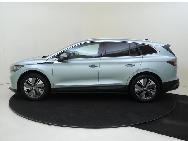 Skoda Enyaq iV 80 | Keyless | 3-zone airco | Achteruitrijcamera | Voorklimatisering | Stoel- en stuurwielverwarming | CarPlay | Cruise control | Navigatie |