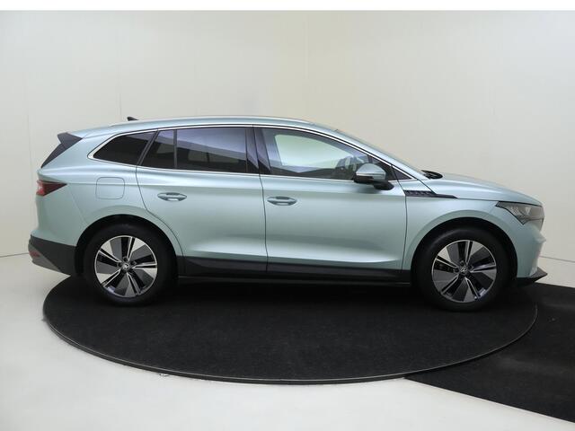 Skoda Enyaq iV 80 | Keyless | 3-zone airco | Achteruitrijcamera | Voorklimatisering | Stoel- en stuurwielverwarming | CarPlay | Cruise control | Navigatie |
