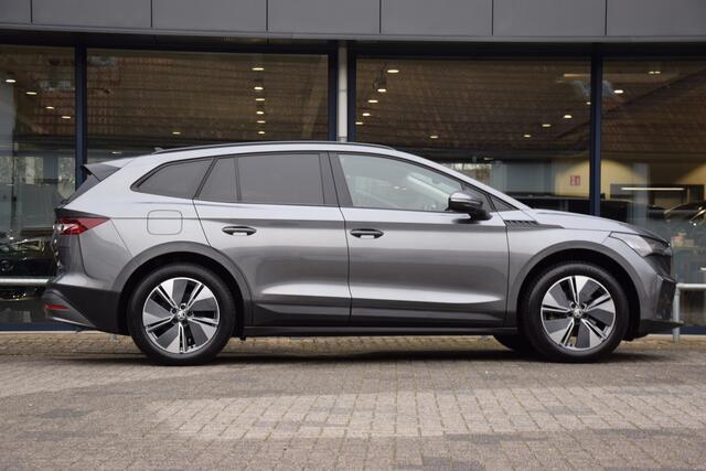 Skoda Enyaq iV 60 | Org. NL | BOVAG Garantie | Voorstoelen + Achterbank verwarmd | Achteruitrijcamera | Adaptive Cruise Control | Elektrisch verstelbare bestuurdersstoel | Verwarmde voorruit |