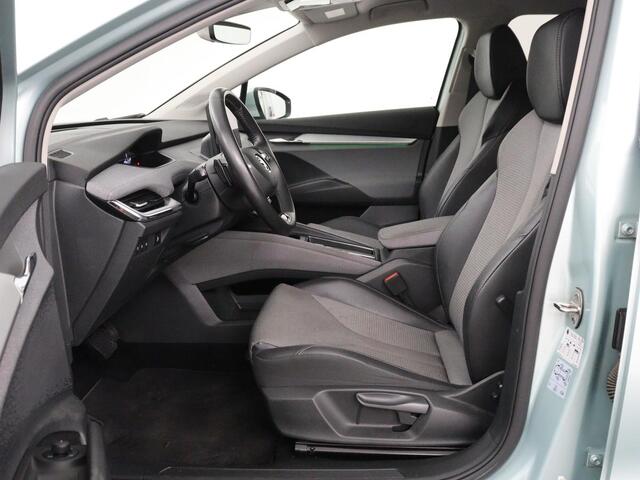 Skoda Enyaq iV 60 | Stoelverwarming | Matrix LED | Camera | Keyless | Stuurverwarming | Carplay | 20'' | Half leder | Navigatie | Chroom Pack | Digital Cockpit | Cruise control | Climate control