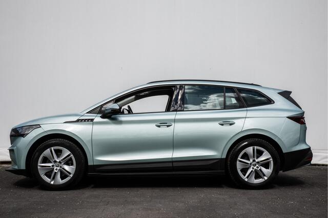 Skoda Enyaq iV 60 SOH 90% Trekhaak/ Full led/ Stoel-stuurverwarming/ Camera/ Blindspot/ Navigatie/ Carplay