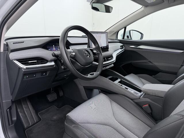 Skoda Enyaq iV 80 82kwh 204PK Camera 1/2 Leer Apple Carplay Android Warmtepomp First Edition Navi 3-Zone-Ecc 19"lm PDC-a+v Adaptive-Cruise Lane-Assist Luxus E-Call Stuurverwarming Led Isofix Keyless-Go DAB Rijstrooksensor Origineel Nederlandse Auto Nieuwprijs ¤ 53.000,