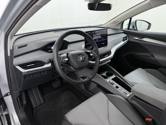 Skoda Enyaq iV 60 SOH 90% Warmtepomp Trekhaak Panoramadak Adap.Cruise Navi Ecc 360°Camera Apple Carplay Android Auto Stuurverwarming Privacy Glas Lmv 19" Led matrix Keyless advanced Rijstrooksensor Origineel Nederlandse Auto