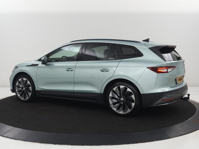 Skoda Enyaq iV 60 | SOH 92.1% | Trekhaak | Stuur/stoel verwarming | Half Leder | Cruise control | Camera | Carplay | Standkachel | Sfeerverlichting | 21''