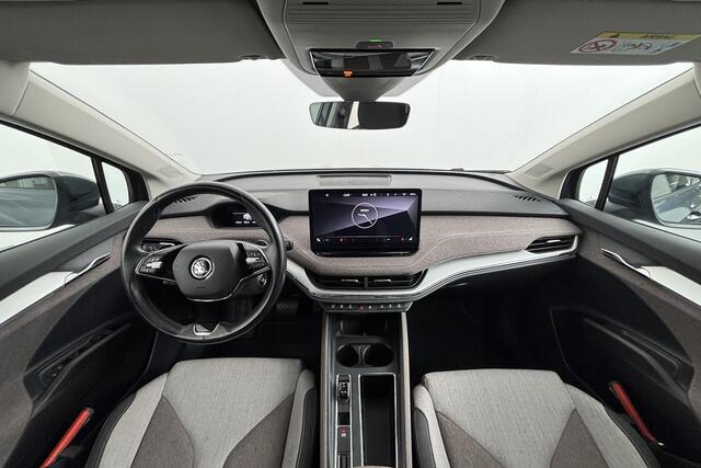 Skoda Enyaq iV 60 First Edition | SOH 92% | Stoelgeheugen | Matrix LED | Stoelverwarming | Parkeersensoren | Onderweg-naar-dealer