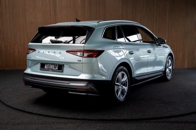 Skoda Enyaq iV 80 SOH: 91,7% Leder Memory Camera Elektr. trekhaak Warmtepomp Navi Climate voor & achter Stoelverwarming PDC Virtual cockpit Cruise control LM velgen BTW auto
