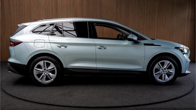Skoda Enyaq iV 80 SOH: 91,7% Leder Memory Camera Elektr. trekhaak Warmtepomp Navi Climate voor & achter Stoelverwarming PDC Virtual cockpit Cruise control LM velgen BTW auto