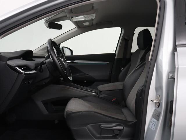 Skoda Enyaq iV 60 | SOH 90,8% | Half leder | Cruise control | Carplay | Sfeerverlichting | Camera | Park assist | Climate control | Elektrische achterklep | Trekhaak