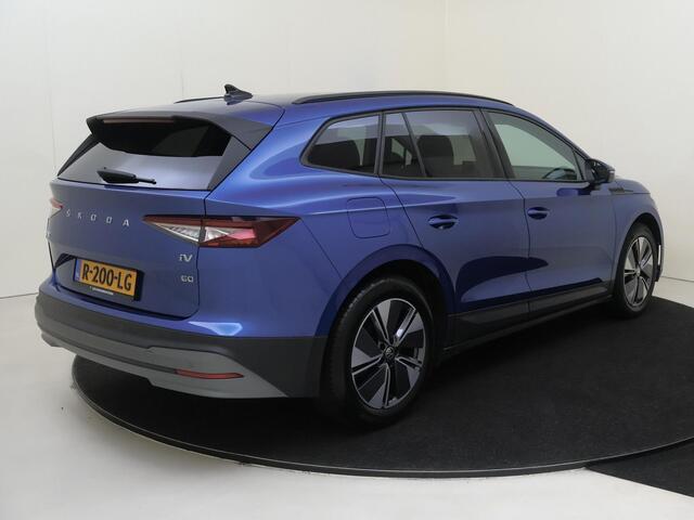 Skoda Enyaq iV 60 | SoH 90% | Navigatie | Stoelverwarming | Keyless | Half lederen bekleding | Cruise control | CarPlay | 3-zone airco |
