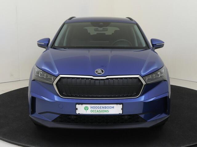 Skoda Enyaq iV 60 | SoH 90% | Navigatie | Stoelverwarming | Keyless | Half lederen bekleding | Cruise control | CarPlay | 3-zone airco |