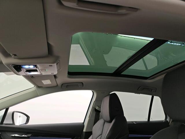 Skoda Enyaq iV 80 (90% SOH) I SCHUIF/KANTELDAK I STOELVERWARMING I LEDEREN SPORTSTOELEN I P-CAMERA