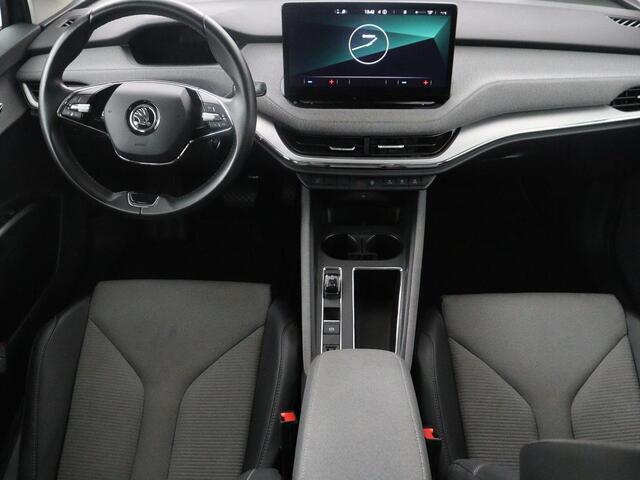 Skoda Enyaq iV 60 | SOH 93,0% | Half leder | Cruise control | Carplay | Climate control | Lane assist | Park assist | Trekhaak | Sfeerverlichting | Navigatie | Bluetooth