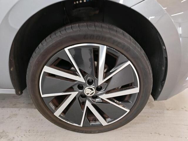 Skoda Kamiq 1.0 TSI Sport Business / Digitaal dashboard / Navigatie / App connect / Parkeersensoren achter / Lichtmetaal 18 inch /