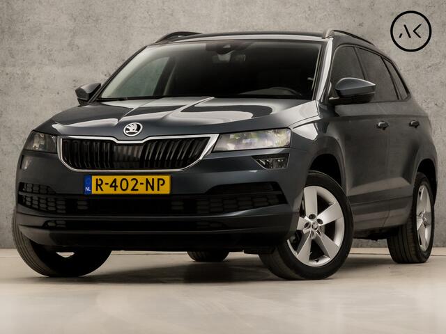 Skoda Karoq 1.5 TSI ACT Ambition Business 150Pk Automaat (APPLE CARPLAY, GROOT NAVI, CAMERA, TREKHAAK, SPORTSTOELEN, GETINT GLAS, PARKEERSENSOREN, CRUISE, NIEUWSTAAT)