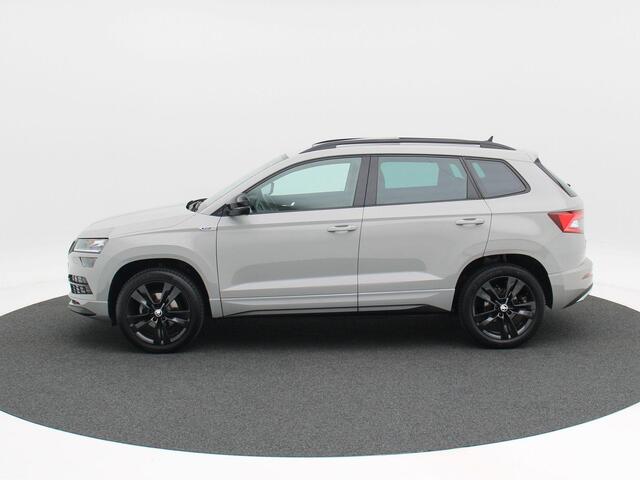 Skoda Karoq 1.5 TSi 150 Pk Automaat Sportline Business | Adaptive Cruise | Climate Control | Panoramadak | Stoelverwarming | Navigatie | Camera | Canton | Carplay | 102.179 Km!!