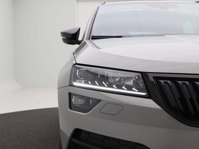 Skoda Karoq 1.5 TSi 150 Pk Automaat Sportline Business | Adaptive Cruise | Climate Control | Panoramadak | Stoelverwarming | Navigatie | Camera | Canton | Carplay | 102.179 Km!!