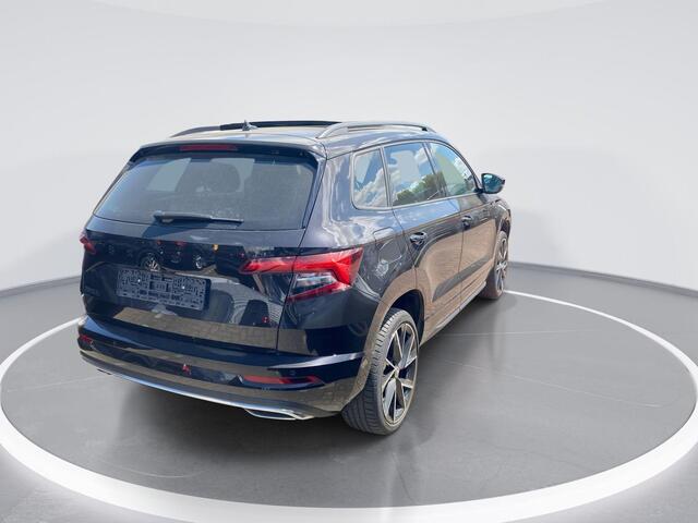 Skoda Karoq 1.5 TSI ACT Sportline Business · Panoramadak · Navigatie · 360° Camera + Parkeersensoren ·