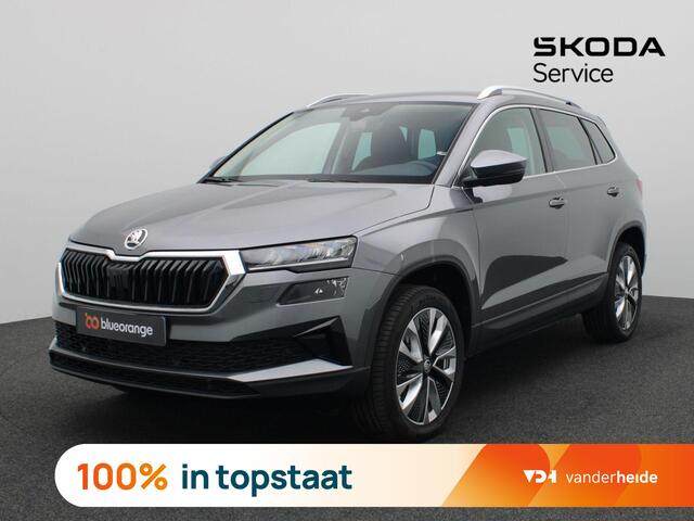 Skoda Karoq 1.5 TSI ACT Business Edition 150PK DSG wegklapbare trekhaak, full led, adaptive cruise, lane assist, elek. bedienbare achterklep, keyless, stuur-stoelverwarming, achteruitrijcamera, 18" lichtmetaal