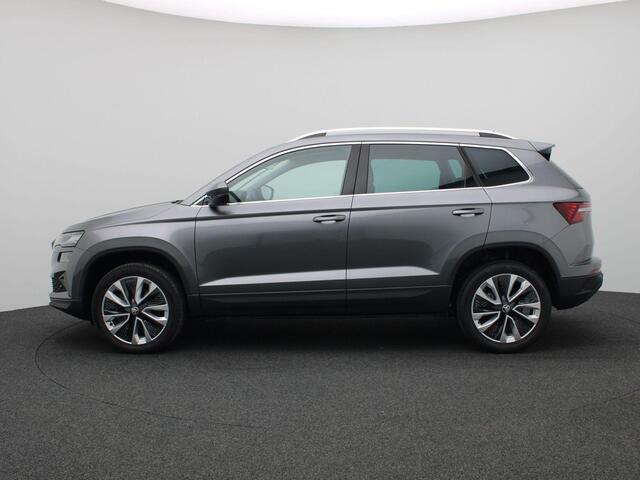 Skoda Karoq 1.5 TSI ACT Business Edition 150PK DSG wegklapbare trekhaak, full led, adaptive cruise, lane assist, elek. bedienbare achterklep, keyless, stuur-stoelverwarming, achteruitrijcamera, 18" lichtmetaal