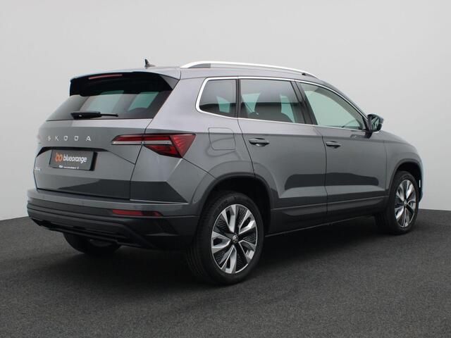Skoda Karoq 1.5 TSI ACT Business Edition 150PK DSG wegklapbare trekhaak, full led, adaptive cruise, lane assist, elek. bedienbare achterklep, keyless, stuur-stoelverwarming, achteruitrijcamera, 18" lichtmetaal