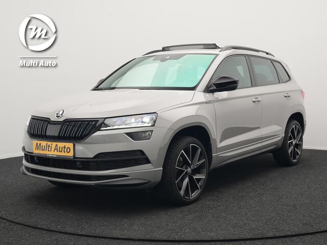 Skoda Karoq 1.5 TSI ACT Sportline 150pk DSG Dealer O.H | Panodak | Trekhaak af Fabriek | Adaptive Cruise | RS Sportstoelen Verwarmd | Camera | 19"L.M | Apple Carplay | Virtual | Keyless |