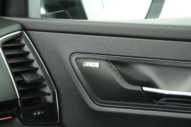 Skoda Karoq 1.5 TSI 150pk DSG ACT Sportline Business Panoramadak Trekhaak Camera Navi Virtual cockpit Clima DCC