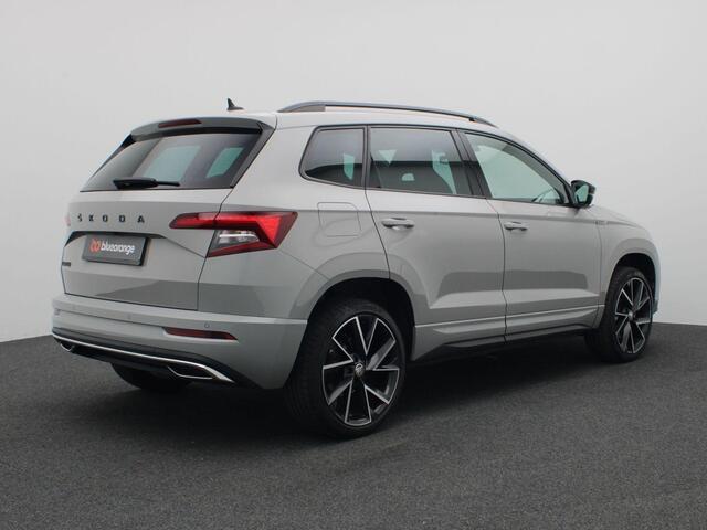 Skoda Karoq 1.5 TSI ACT Sportline Business 150PK DSG Adaptieve Cruise Controle, Achteruitrijcamera, Keyless, Side Assist, Stoelverwarming, Virtual Pedal, Virtual Cockpit, 19" LM Velgen