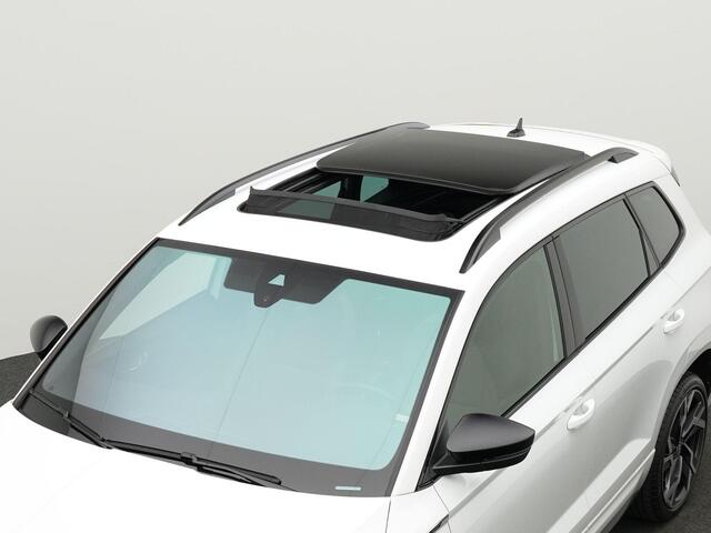 Skoda Karoq 1.5 TSI ACT 150 pk DSG Sportline Business | Panoramadak | Trekhaak | Standkachel | Leder | Navigatie Columbus | Geheugenstoelen | Adaptief onderstel
