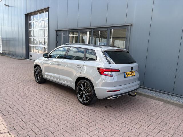 Skoda Karoq 1.5 TSi 150pk 4x4 DSG Scout Sportline Business CAMERA/ADAPT.CRUISE/CANTON/19INCH/AFN.TREKHAAK