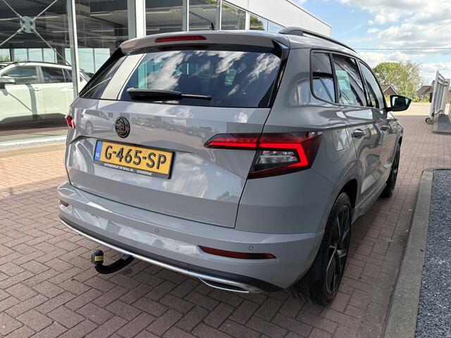 Skoda Karoq 1.5 TSi 150pk 4x4 DSG Scout Sportline Business CAMERA/ADAPT.CRUISE/CANTON/19INCH/AFN.TREKHAAK