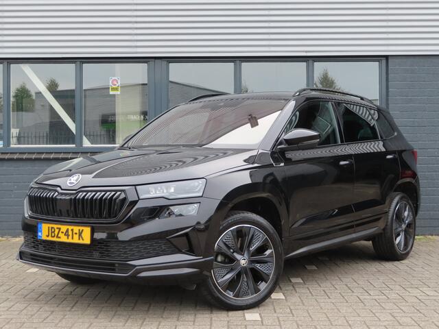 Skoda Karoq 1.5 TSI ACT Sportline Business DSG | voorruitverwarming | verwarmbare voorstoelen + achterbank | stuurwiel verwarmbaar | camera