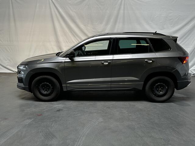 Skoda Karoq 1.5 TSI ACT Sportline Business / AUTOMAAT/ TREKHAAK/ CAMERA/ PARK. SENSOREN/ CRUISE/ MATRIX LED/ STOELVERWARM. V&A/ CHASSIS CONTROL/ VIRTUAL COCKPIT/ KEYLESS/ STUURVERWARM./ SMARTLINK/ DAB/ CLIMA