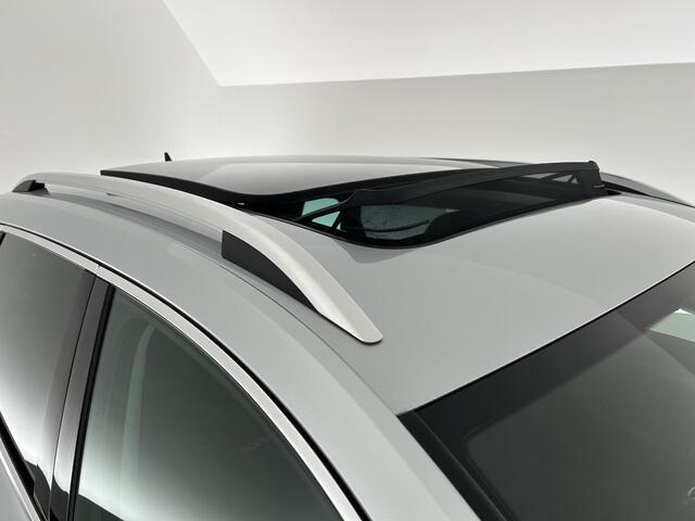 Skoda Karoq 1.5 TSI 150pk DSG ACT Scout Camera Keyless Stoelverwarming Virtual Cockpit Panoramadak Navigatie