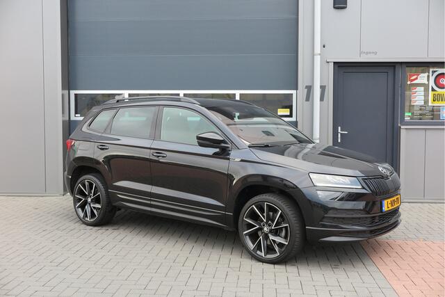 Skoda Karoq 1.5 TSI ACT 150pk Sportline Business Stoelverwarming , Led verlichting , DAB+ radio , Carplay ,Canton sound systeem, Achteruitrijcamera , Parkeersensoren ,Electr. achterklep ,etc.