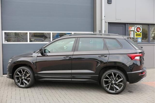 Skoda Karoq 1.5 TSI ACT 150pk Sportline Business Stoelverwarming , Led verlichting , DAB+ radio , Carplay ,Canton sound systeem, Achteruitrijcamera , Parkeersensoren ,Electr. achterklep ,etc.