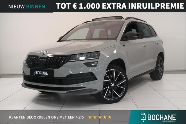 Skoda Karoq 1.5 TSI ACT Sportline Business | Adaptieve cruisecontrol | Camera | Panoramadak | Trekhaak | CANTON audio | Elektr achterklep | Stuur en stoel verwarming |