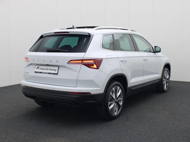 Skoda Karoq 1.5TSI/150PK DSG Business Edition · Panoramadak · Parkeersensoren + Camera · App-Connect · Garantie t/m 25-03-2028 of 60.000km