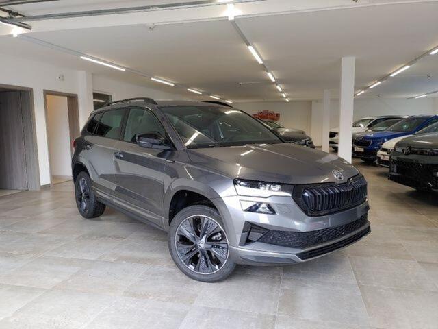 Skoda Karoq 1.5 TSI DSG SPORTLINE TREKHAAK/CAMERA/CARPLAY/ACC/STOELVERW/E-KLEP