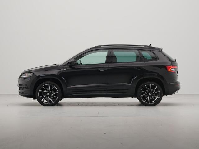 Skoda Karoq 1.5 TSI ACT 150pk Sportline Navigatie Trekhaak Camera Keyless Stoelverwarming 37 voorruit word vervangen