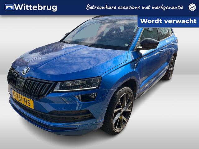 Skoda Karoq 1.5 TSI ACT Sportline Business / Digitaal dashboard / Navigatie / trekhaak / Camera / Parkeer sensoren V+A / Canton /