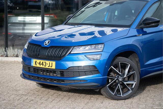 Skoda Karoq 1.5 TSI ACT Sportline Business | Trekhaak | Adapt. Cruise | CANTON | Camera | 19" | Winterpakket